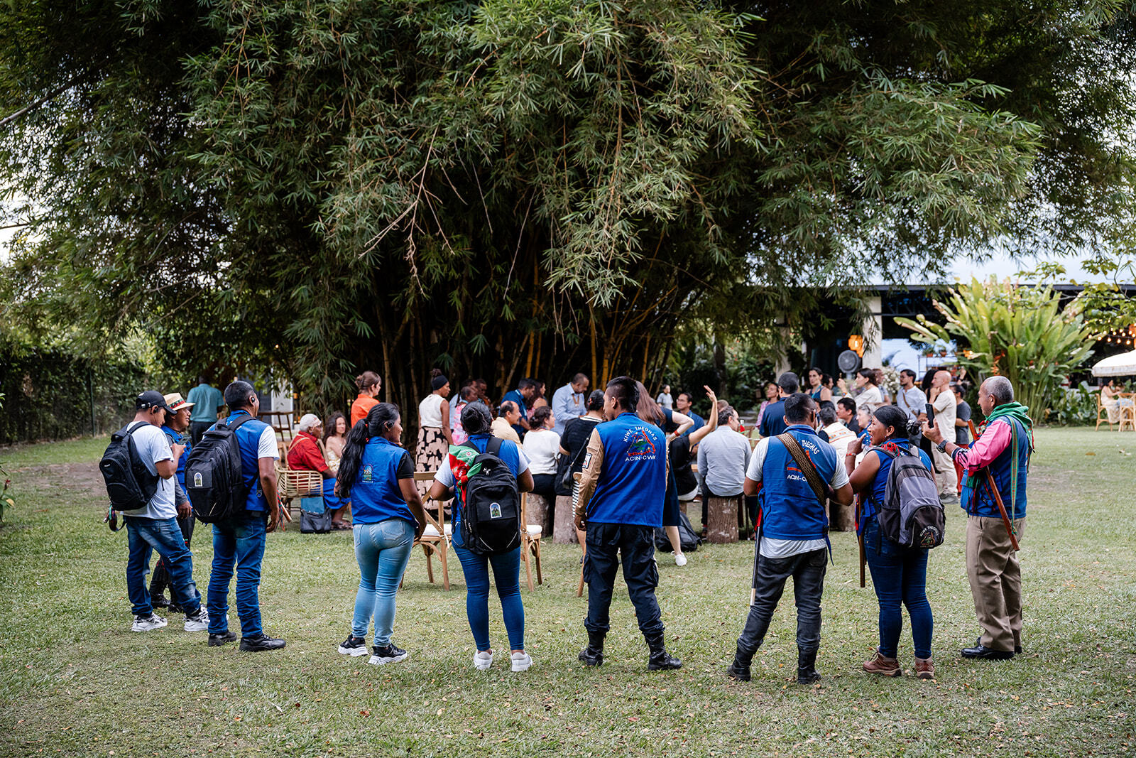 Group gathers in a circle at the Nature House gathering in partnership with Nia Tero during COP16 in Cali, Colombia. Photo by Joe Short / Nature House.