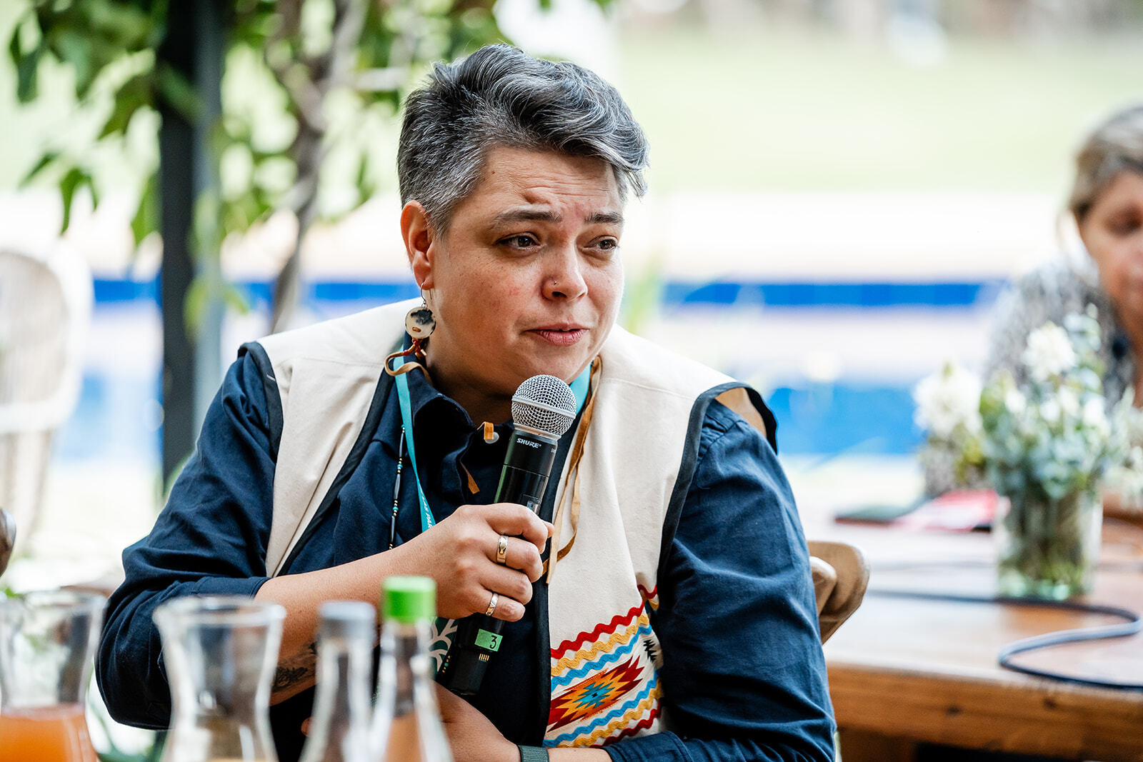 Valérie Courtois (Innu Nation in what is now more commonly known as Canada), Executive Director of the Indigenous Leadership Initiative (ILI) speaks at the Nature House gathering in partnership with Nia Tero during COP16 in Cali, Colombia. Photo by Joe Short / Nature House.