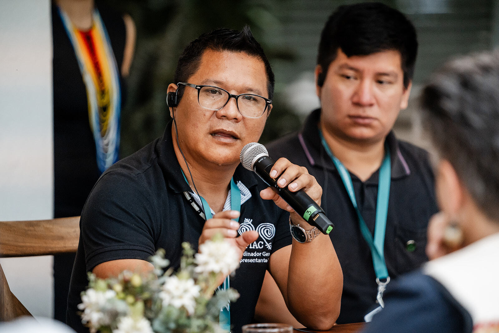 Oswaldo Muca Castizo (Tanimuca People, Colombia), General Coordinator of the National Organization of Indigenous Peoples of the Colombian Amazon (OPIAC) speaks at the Nature House gathering in partnership with Nia Tero during COP16 in Cali, Colombia. Photo by Joe Short / Nature House.