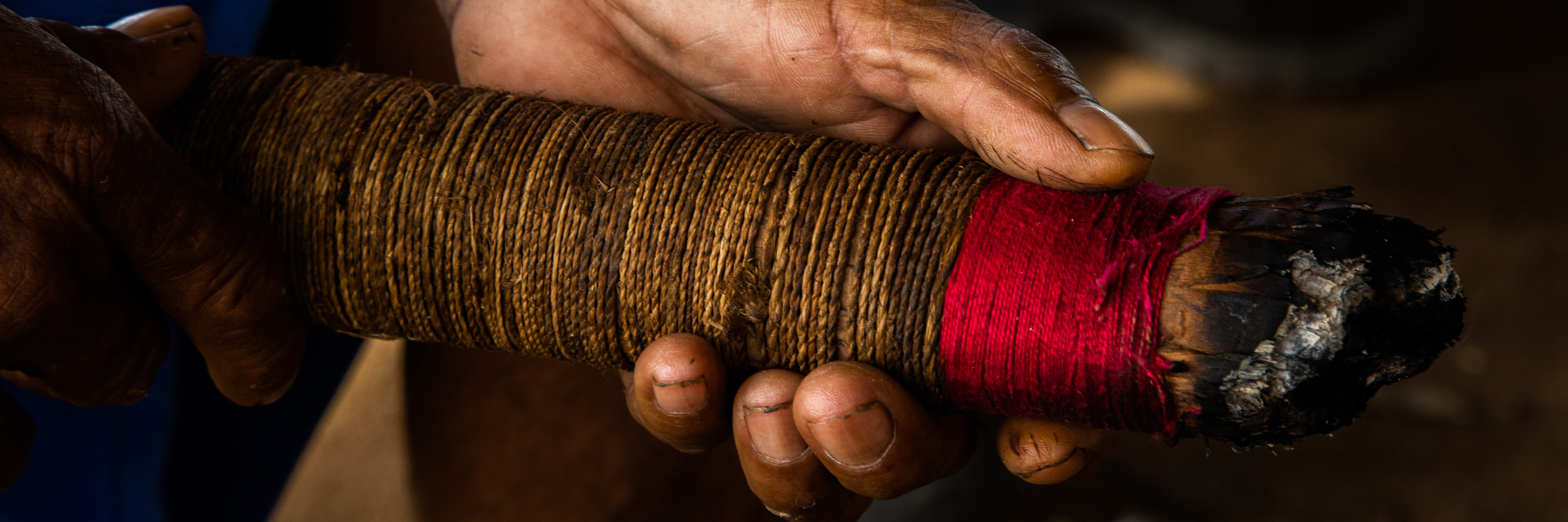 Photo of hands holding smoking bundle by Kamikia Kisedje