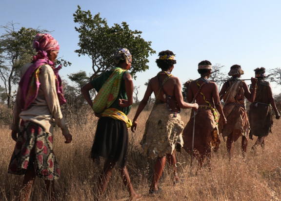 Ju'hoan women walking on their lands in Namibia.